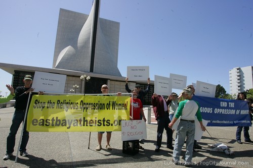 Protesters rally outside St. Mary's Cathedral in San Francisco against the Catholic Church's crackdown on nuns and women's reproduction rights.