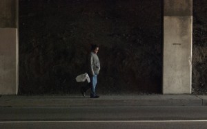 Irma Garcia walks under an overpass in South San Francisco on Tuesday (Feb.14) heading back to her campsite to feed her 7-month-old cat she named "Joey".