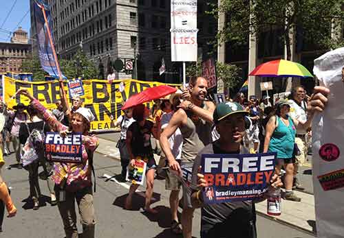 Supporters of Bradley Manning held signs that read "Free Bradley."