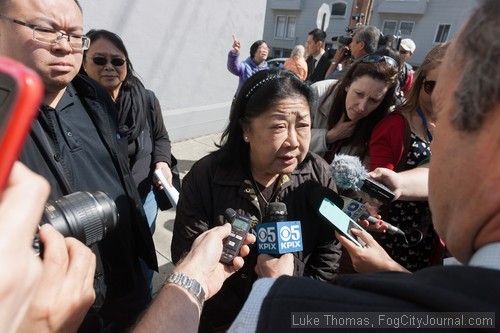 Chinatown community leader Rose Pak takes questions from reporters.