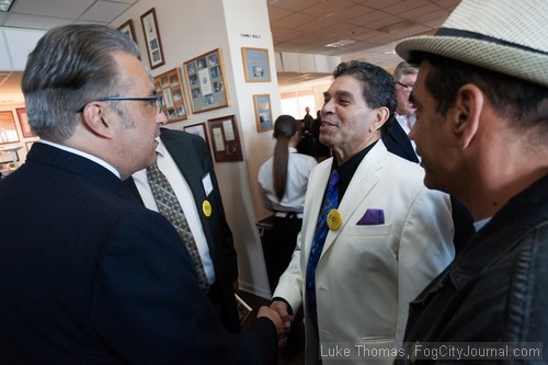 Sheriff Ross Mirkarimi greets former Tower of Power lead singer Rick Stevens.