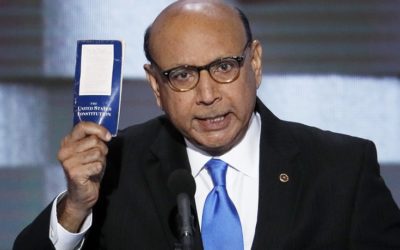 Khizr Khan holds up a copy of the U.S. Constitution during a speech at the Democratic National Convention, questioning whether Republican presidential nominee Donald Trump has ever read it.