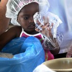 Volunteers Prepare Emergency Food Aid for Global Consumption